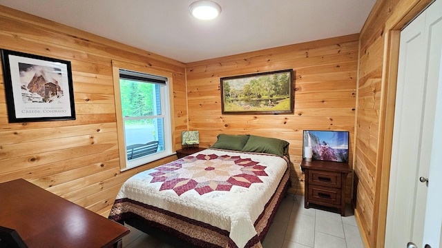 62 Cobb Rd, Stetson, ME 04488 - bedroom featuring access to outside, wooden walls, and light tile patterned floors