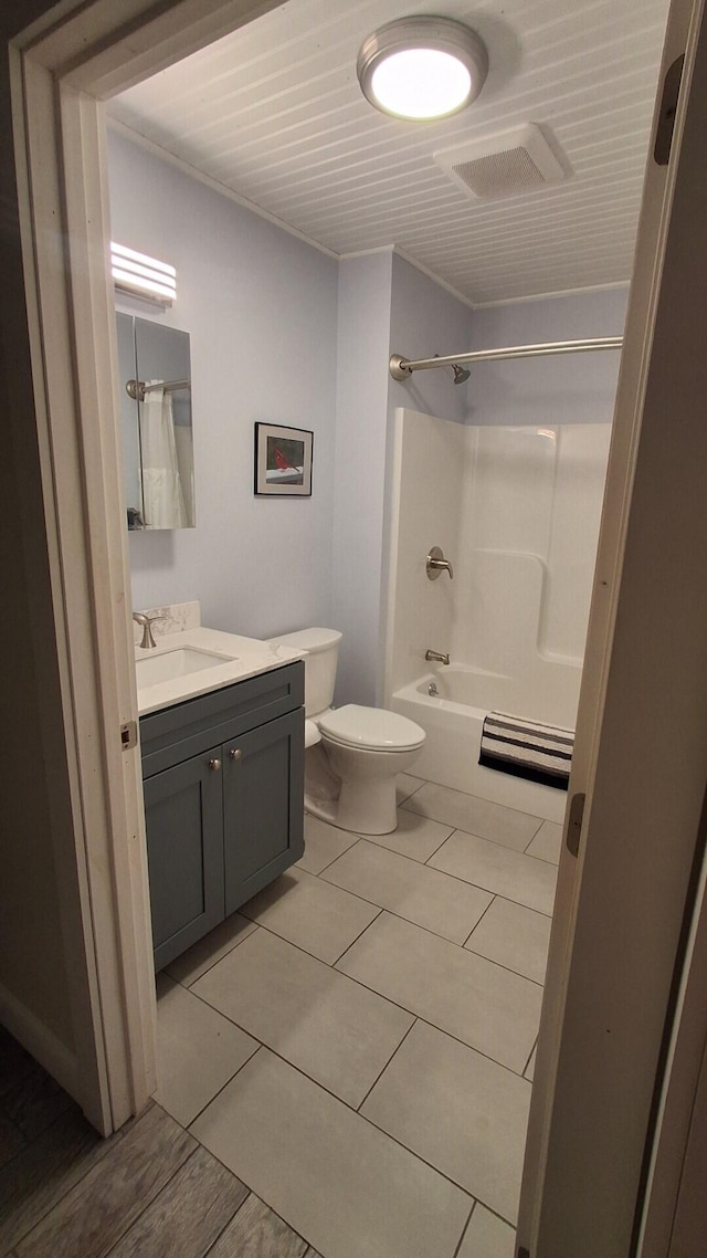 62 Cobb Rd, Stetson, ME 04488 - bathroom with vanity, shower / tub combination, and tile patterned floors