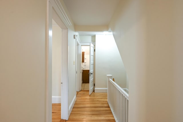 18 Colonial Rd Unit 18, Portland, ME 04102 - hallway with an upstairs landing and light wood-type flooring