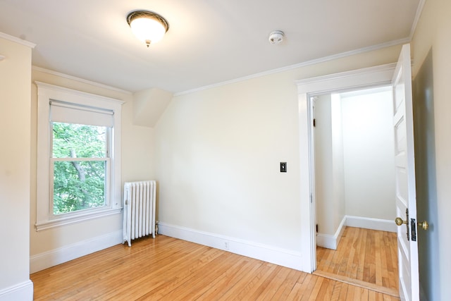 18 Colonial Rd Unit 18, Portland, ME 04102 - bonus room featuring radiator heating unit and light wood-style flooring