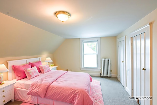 18 Colonial Rd Unit 18, Portland, ME 04102 - carpeted bedroom featuring radiator and lofted ceiling