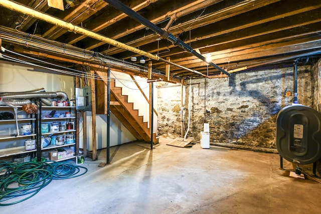 18 Colonial Rd Unit 18, Portland, ME 04102 - unfinished below grade area with heating fuel, electric panel, and stairs