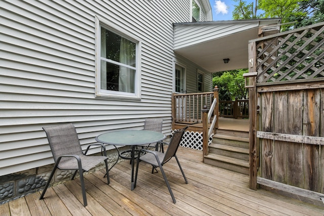 214 S Main St, Auburn, ME 04210 - wooden deck featuring outdoor dining area