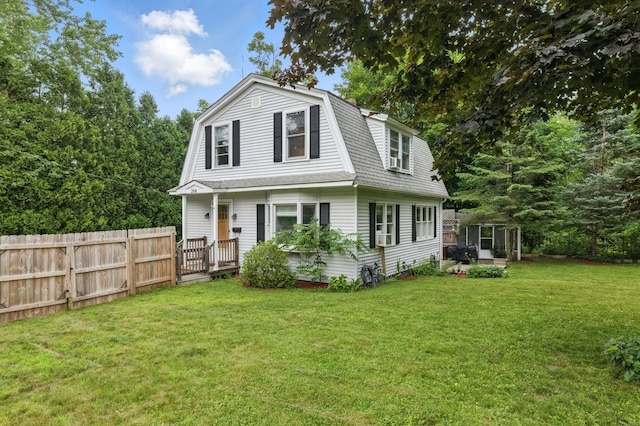 214 S Main St, Auburn, ME 04210 - colonial inspired home with a gambrel roof and a shingled roof
