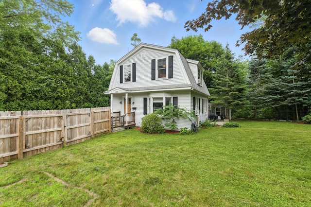 214 S Main St, Auburn, ME 04210 - colonial inspired home featuring a gambrel roof