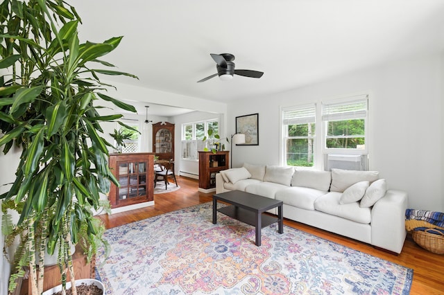 214 S Main St, Auburn, ME 04210 - living area featuring a ceiling fan and wood finished floors