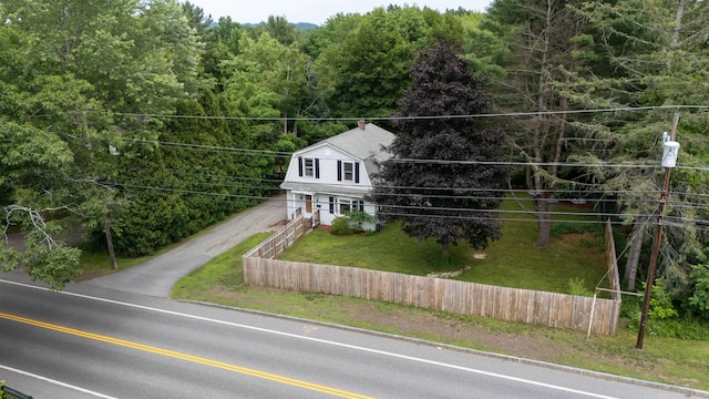 214 S Main St, Auburn, ME 04210 - view of front of home with a gambrel roof, a wooded view, and driveway