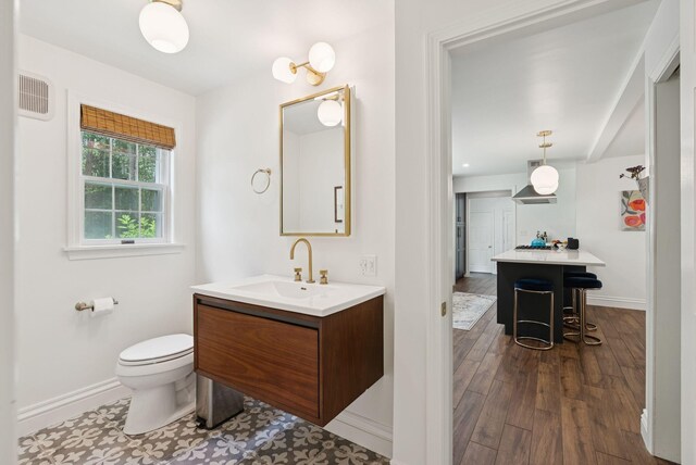 6 Beechwood Ln, Falmouth, ME 04105 - bathroom with vanity and wood finished floors