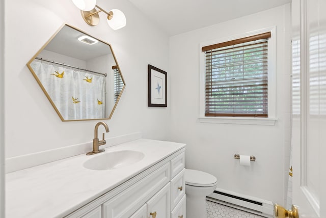 6 Beechwood Ln, Falmouth, ME 04105 - bathroom with a baseboard radiator, vanity, and tile patterned flooring