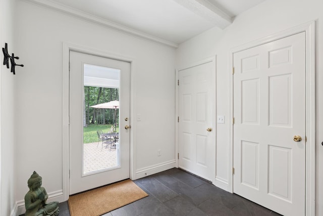 6 Beechwood Ln, Falmouth, ME 04105 - entryway featuring beamed ceiling, dark tile patterned flooring, and crown molding