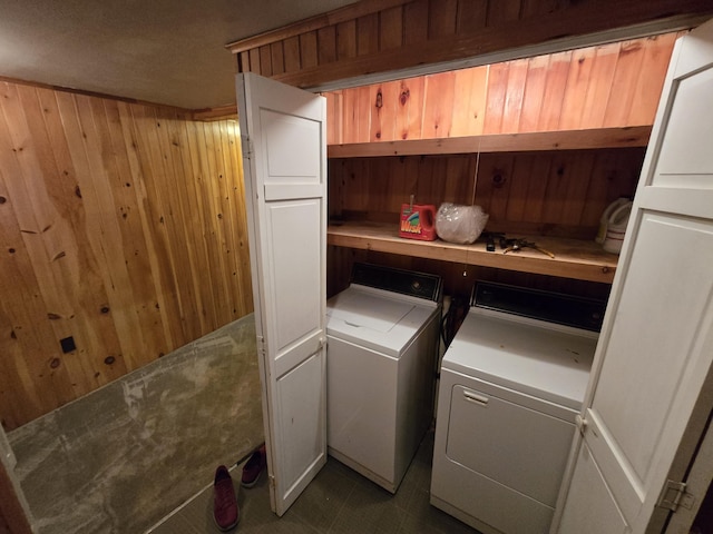 83 Milts Way, Lincoln, ME 04457 - laundry room featuring wooden walls, cabinet space, and washer and clothes dryer