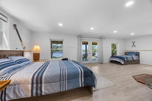 52 Ludden Ln, Lincoln, ME 04457 - bedroom with french doors, access to outside, recessed lighting, multiple windows, and light wood-type flooring
