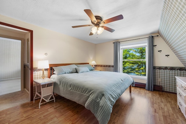 52 Ludden Ln, Lincoln, ME 04457 - bedroom featuring light wood-style flooring, a ceiling fan, and vaulted ceiling