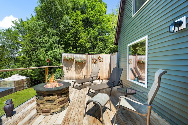 52 Ludden Ln, Lincoln, ME 04457 - deck with a fire pit