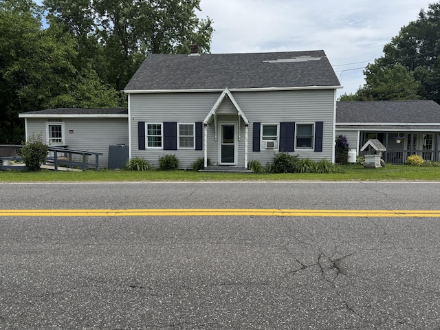 27 Main St, Vassalboro, ME 04989 - view of front of house with roof with shingles and cooling unit