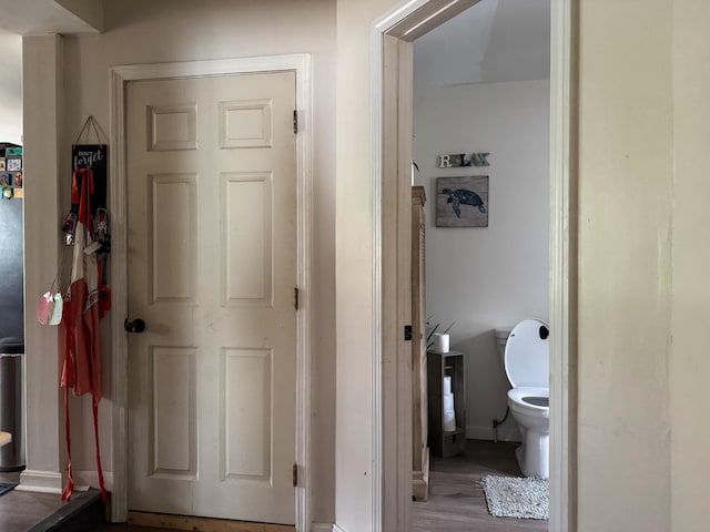 27 Main St, Vassalboro, ME 04989 - hall featuring baseboards and wood finished floors