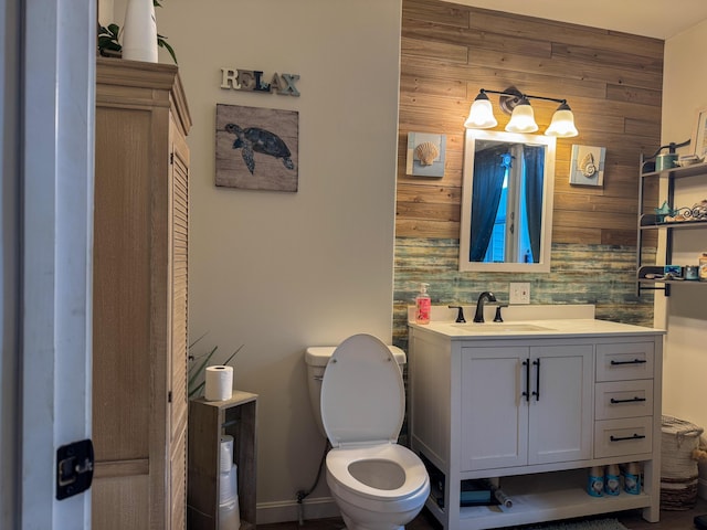 27 Main St, Vassalboro, ME 04989 - half bathroom with wood walls and vanity
