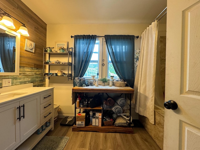 27 Main St, Vassalboro, ME 04989 - full bath with wooden walls, vanity, and wood finished floors