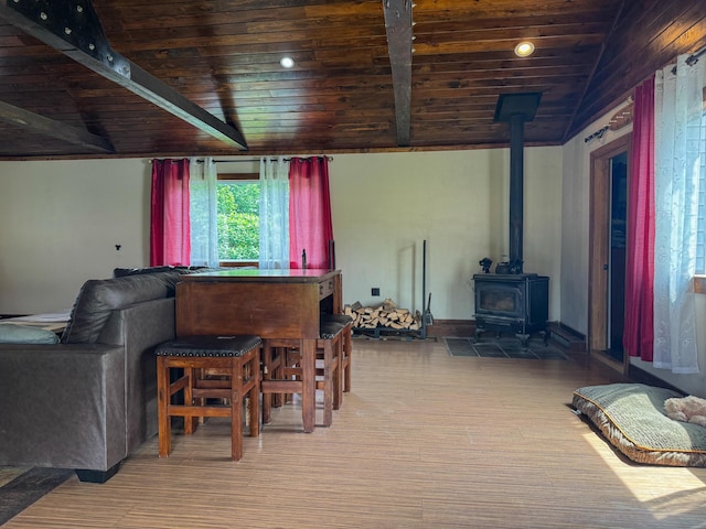 27 Main St, Vassalboro, ME 04989 - living room with wooden ceiling, a wood stove, lofted ceiling, and wood finished floors
