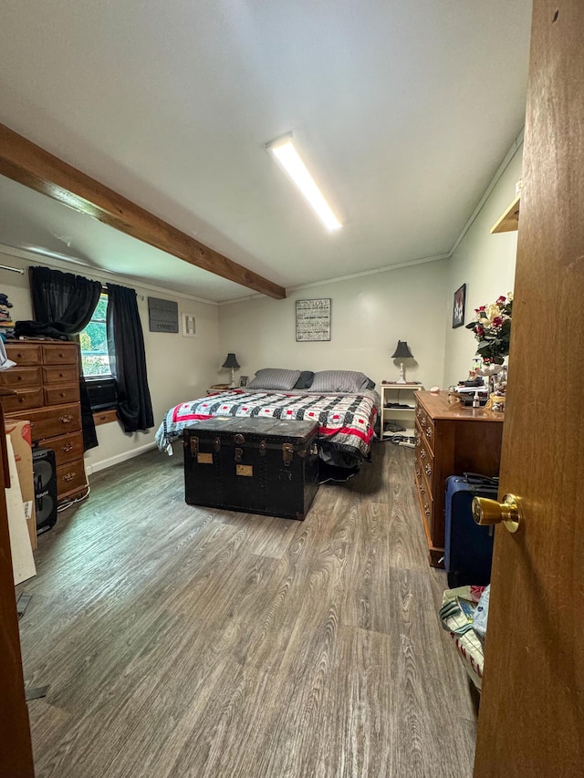 27 Main St, Vassalboro, ME 04989 - bedroom featuring wood finished floors and beam ceiling