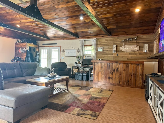 27 Main St, Vassalboro, ME 04989 - living area featuring wood walls, french doors, wooden ceiling, and wood finished floors