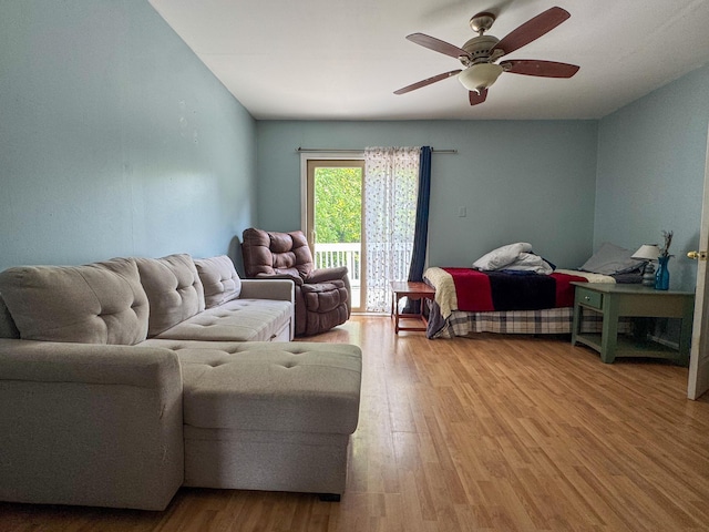 27 Main St, Vassalboro, ME 04989 - bedroom featuring access to outside, wood finished floors, and a ceiling fan