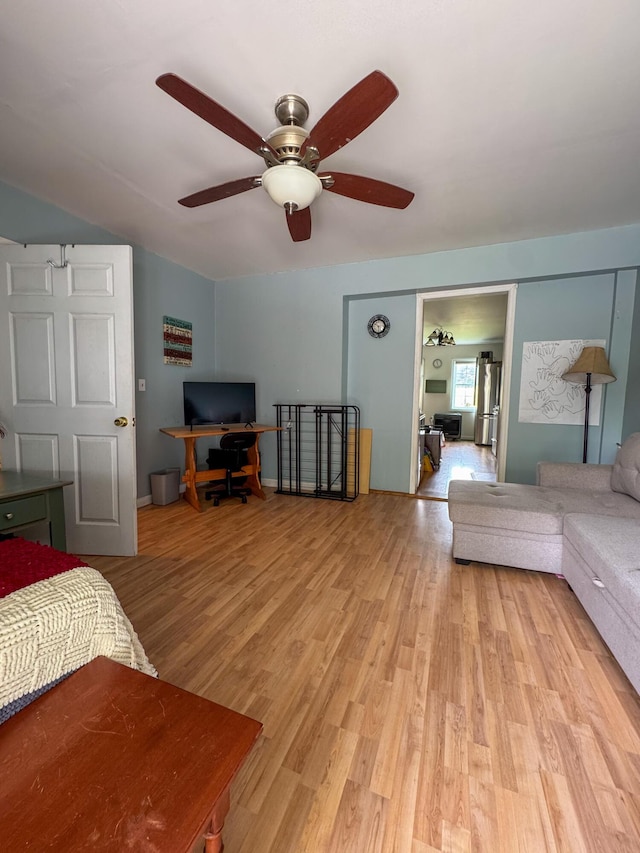 27 Main St, Vassalboro, ME 04989 - bedroom with a desk, light wood-style flooring, and ceiling fan