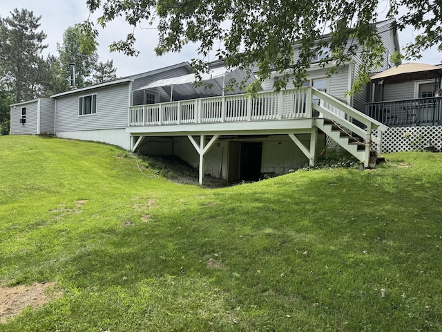 27 Main St, Vassalboro, ME 04989 - back of property featuring a deck and a lawn