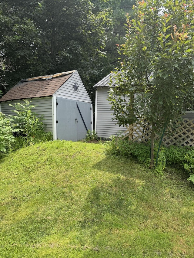 27 Main St, Vassalboro, ME 04989 - view of grassy yard with a storage shed