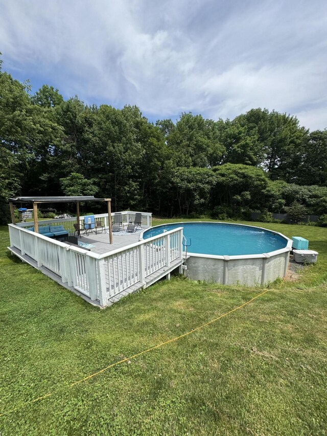 27 Main St, Vassalboro, ME 04989 - outdoor pool with a lawn and a deck
