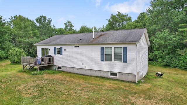 32 Barton Rd, Windsor, ME 04363 - back of house featuring roof with shingles, a deck, and a yard
