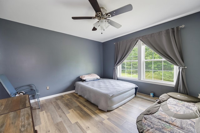 32 Barton Rd, Windsor, ME 04363 - bedroom featuring wood finished floors and ceiling fan