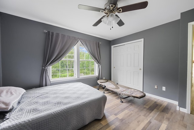 32 Barton Rd, Windsor, ME 04363 - bedroom with wood finished floors, a closet, and a ceiling fan