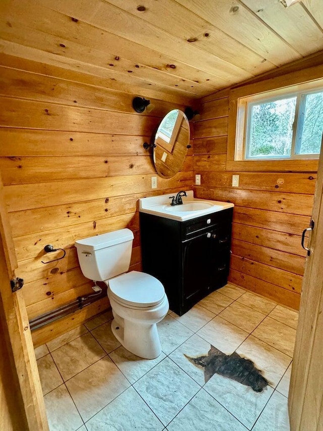 5 Abagail Rock Rd, Vinalhaven, ME 04863 - bathroom featuring vanity, wooden ceiling, wood walls, and tile patterned flooring