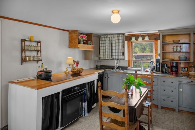 138 Main St, Brownfield, ME 04010 - kitchen with black appliances, open shelves, and gray cabinets