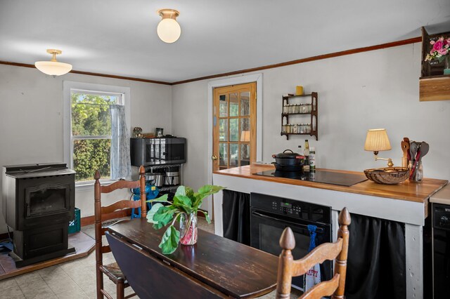 138 Main St, Brownfield, ME 04010 - dining space with ornamental molding and tile patterned floors