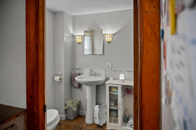 138 Main St, Brownfield, ME 04010 - bathroom featuring toilet and tile patterned flooring