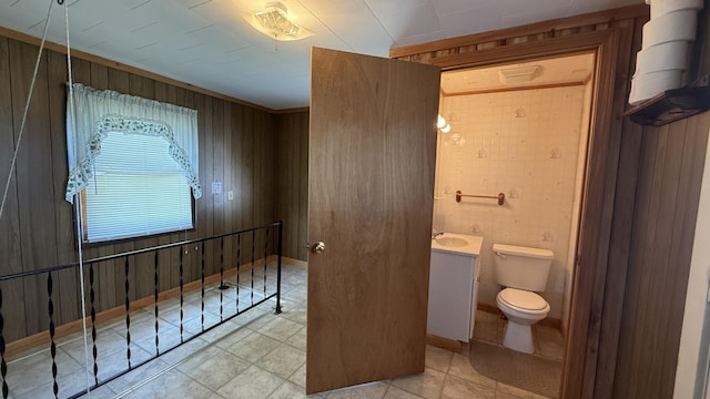 269 County Rd, Lubec, ME 04652 - bathroom with vanity and wood walls