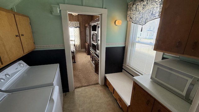 269 County Rd, Lubec, ME 04652 - laundry room featuring washer and clothes dryer and light colored carpet