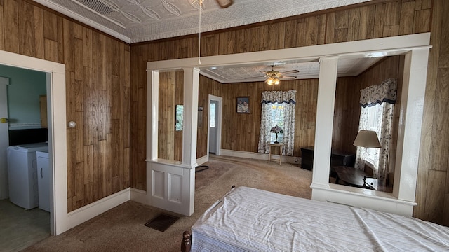 269 County Rd, Lubec, ME 04652 - carpeted bedroom featuring wood walls, an ornate ceiling, and ornamental molding