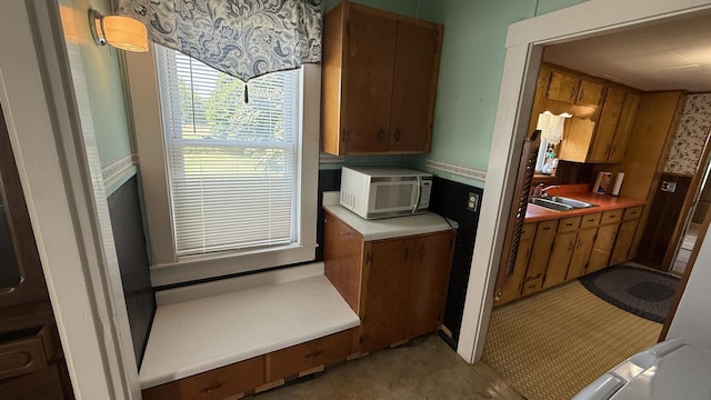 269 County Rd, Lubec, ME 04652 - kitchen featuring brown cabinetry and light countertops