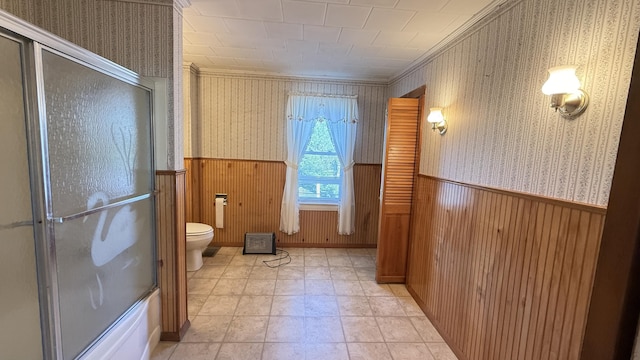 269 County Rd, Lubec, ME 04652 - bathroom featuring wainscoting, wallpapered walls, wooden walls, and ornamental molding