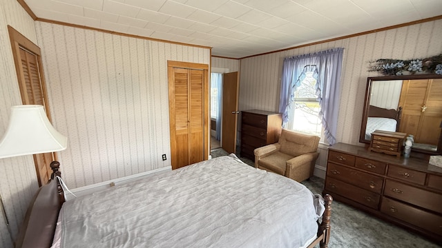 269 County Rd, Lubec, ME 04652 - carpeted bedroom with ornamental molding, wallpapered walls, and a closet