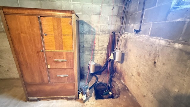 269 County Rd, Lubec, ME 04652 - bathroom with unfinished concrete floors and concrete block wall