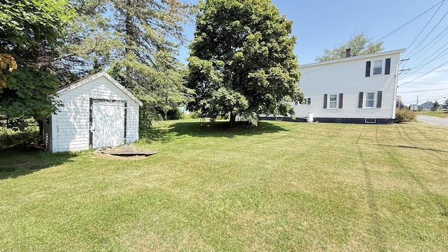 269 County Rd, Lubec, ME 04652 - view of grassy yard with a storage shed