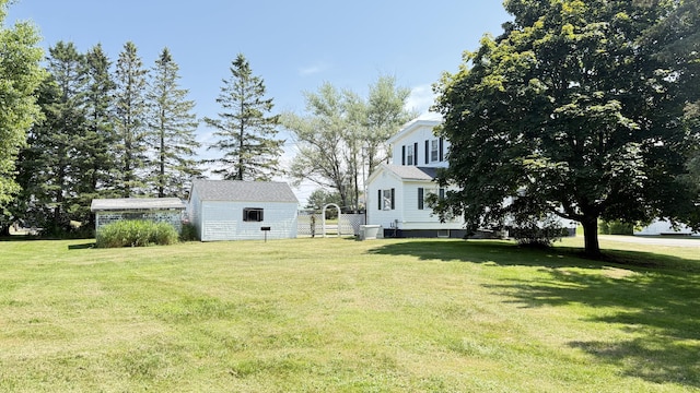 269 County Rd, Lubec, ME 04652 - view of green lawn featuring a shed