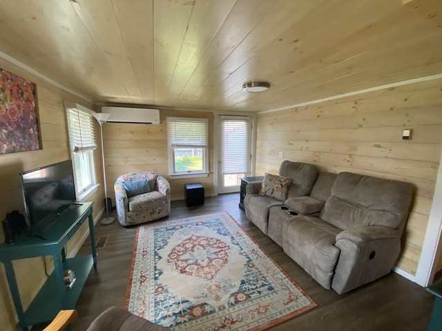 48 Dane Ave, Skowhegan, ME 04976 - living room with a wall mounted air conditioner, wooden walls, wood finished floors, and wooden ceiling