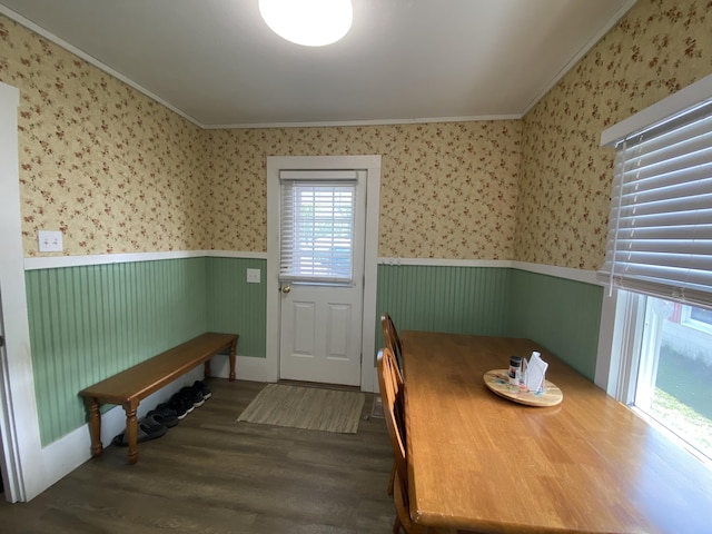 48 Dane Ave, Skowhegan, ME 04976 - dining area featuring crown molding, a wainscoted wall, wood finished floors, and wallpapered walls