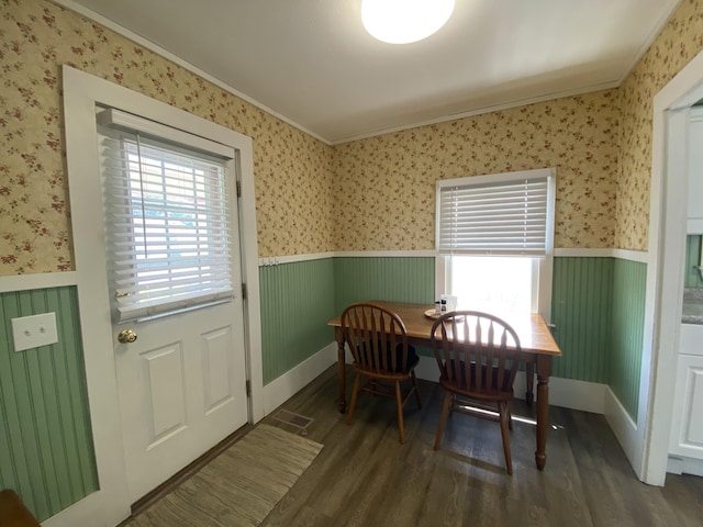 48 Dane Ave, Skowhegan, ME 04976 - dining room with crown molding, a wainscoted wall, wood finished floors, and wallpapered walls