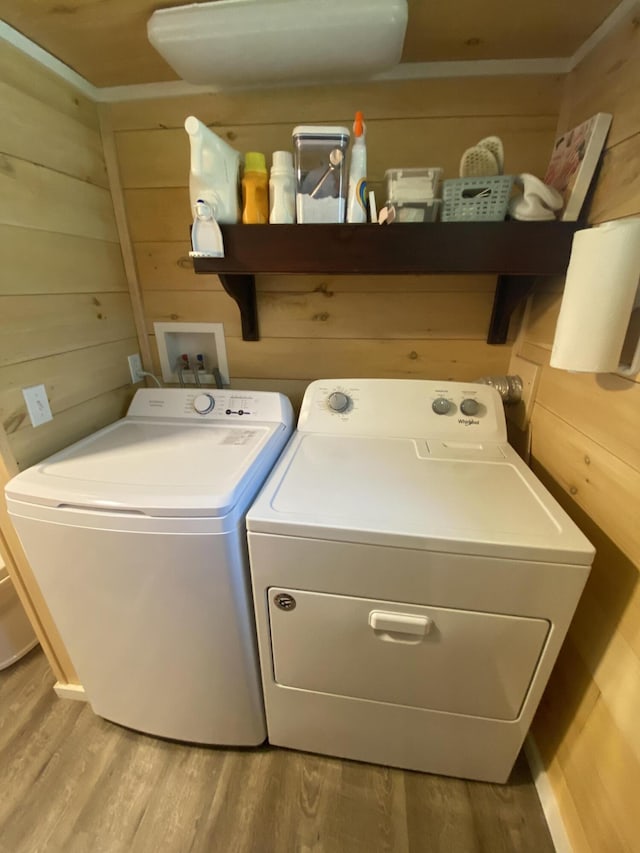 48 Dane Ave, Skowhegan, ME 04976 - laundry room featuring washer and dryer, wood finished floors, and wood walls